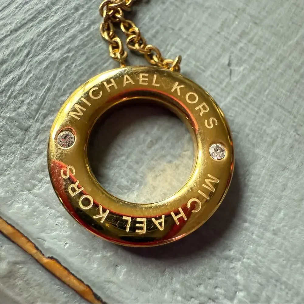 Michael Kors Gold Tone Ring Pendant Necklace